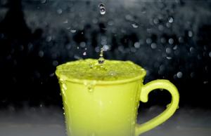 Steam overflowing green cup
