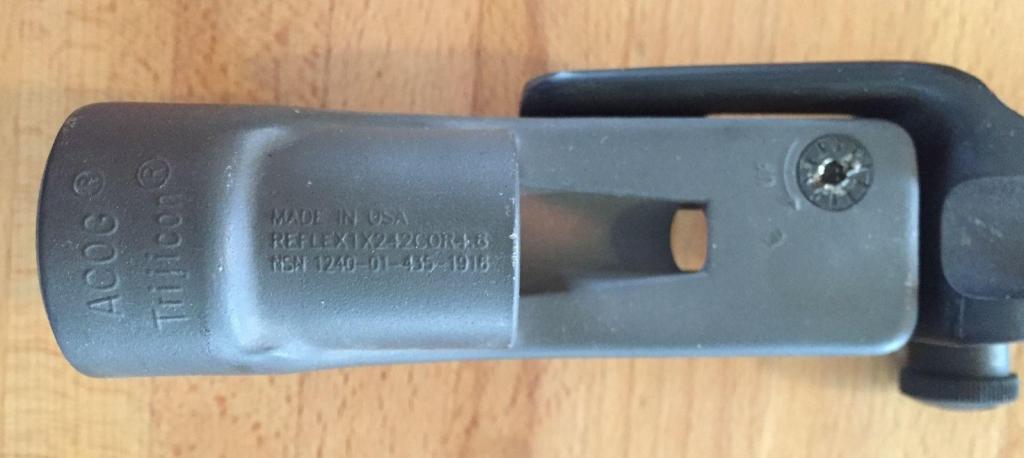 Trijicon makes machine gun sighting and engraved scripture on them