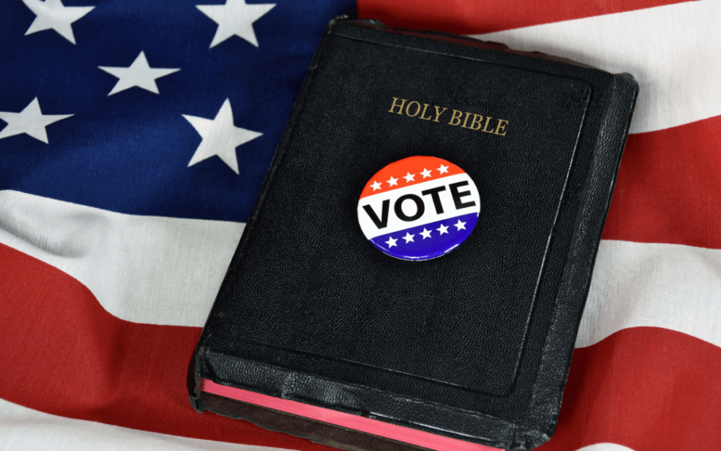 Christian Bible on top of an American flag with a Vote button
