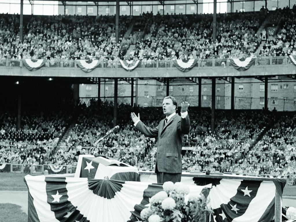 Rev. Billy Graham preaches during the annual Reformation Day in the Polo Grounds in New York City on October 27, 1957.