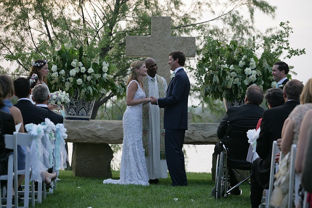Henry Hager and Jenna Bush exchange vows at the altar Saturday, May 10, 2008, during their wedding ceremony at Prairie Chapel Ranch near Crawford, Texas. Presiding over the ceremony is the Rev. Kirbyjon Caldwell of Houston's Windsor Village United Methodist Church.