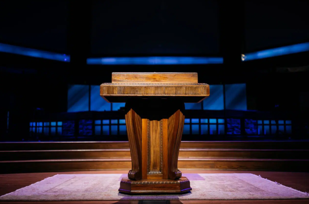 An empty lectern in a church's pulpit 