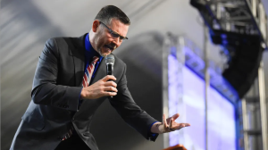 Pastor Greg Locke screaming from the pulpit in his Tennessee church