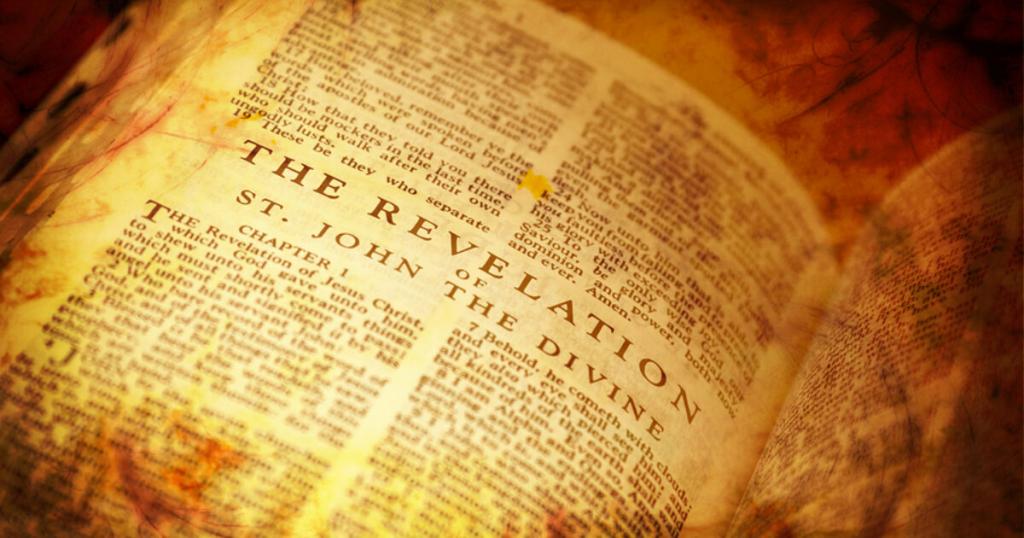 An image of old paper open to the Book of Revelation, Chapter 1