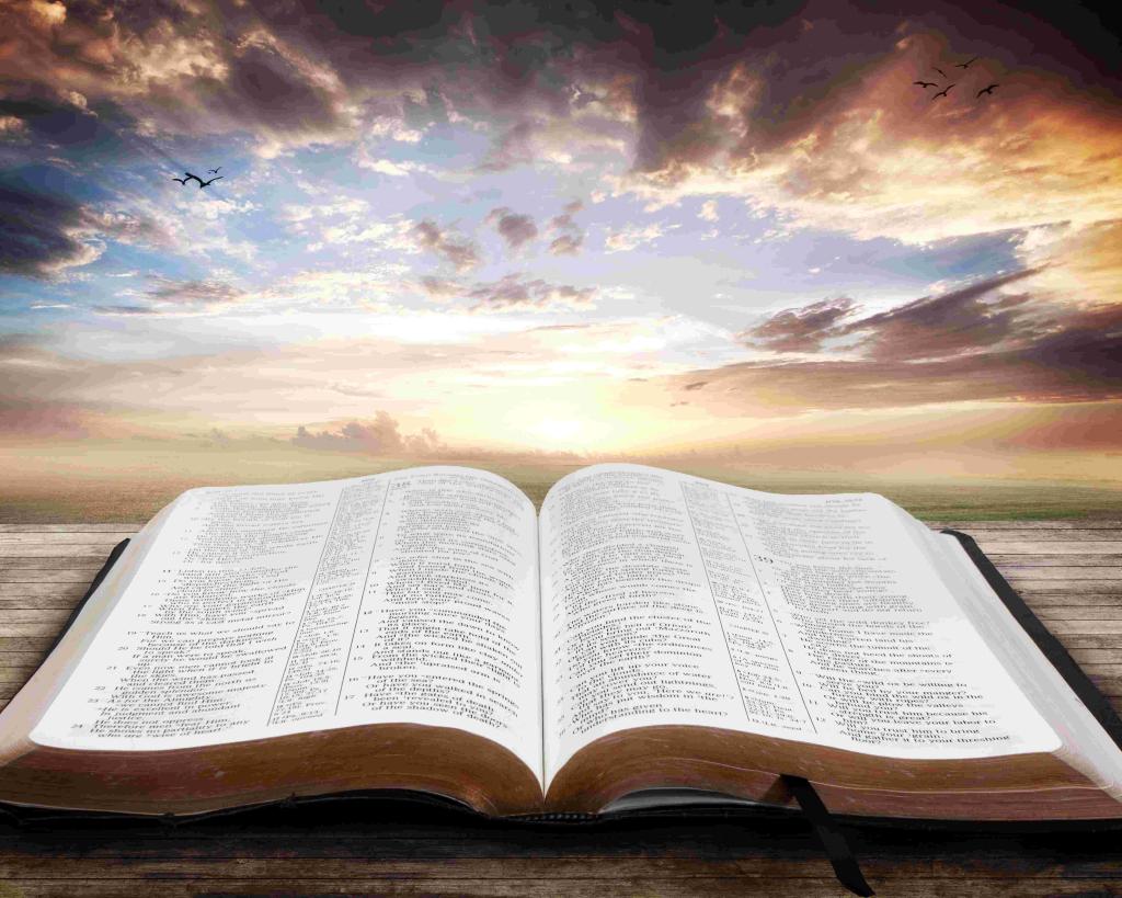 a nice sunset over an open bible