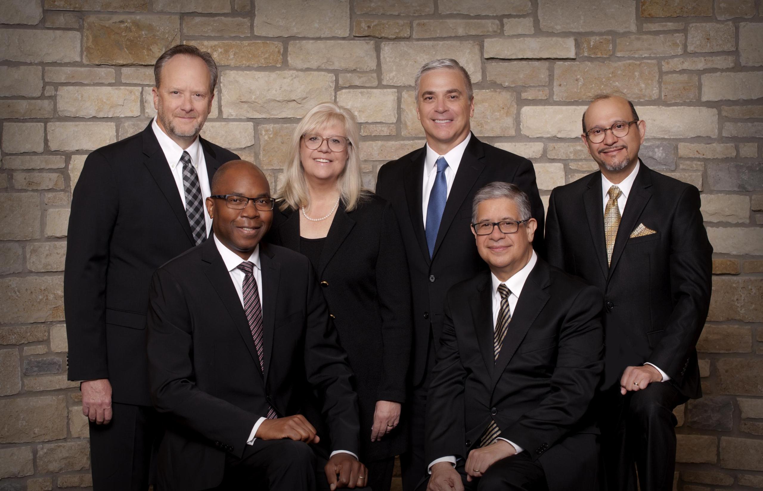 Church of the Nazarene Board of General Superintendents (BGS). Back row left to right: T. Scott Daniels, Carla Sunberg, David Music, Gustavo Crocker; Front Row left to right: Filimão Chambo, Christian Sarmiento.