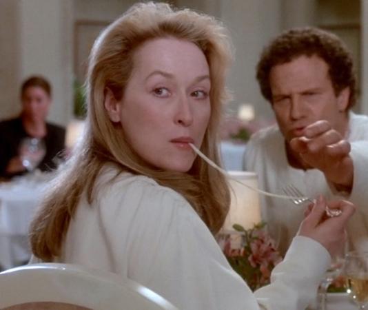 Meryl Streep (Left foreground) and Albert Brooks (Right background) in "Defending Your Life".
