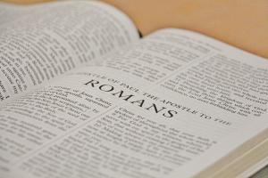 Bible open to first page of Romans