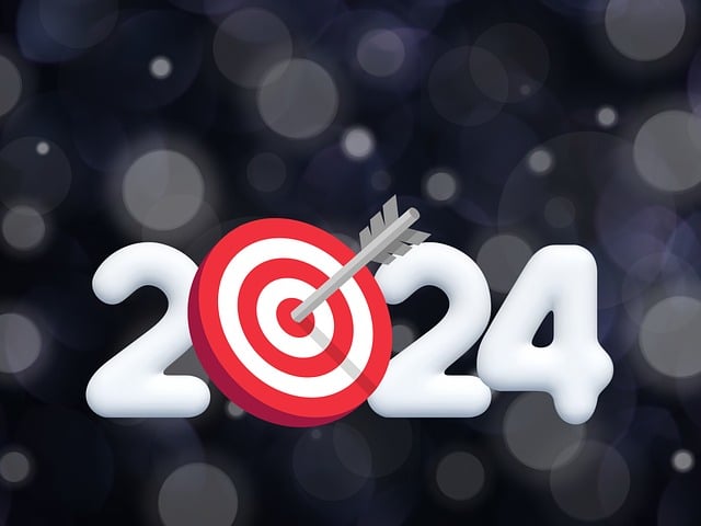 Year 2024 in white on a black background with a target for the zero