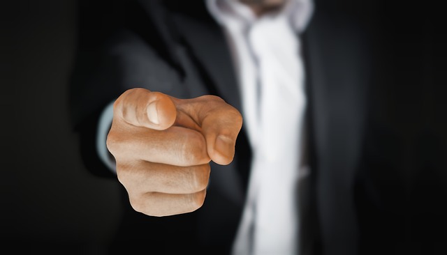 Man's finger pointing straight at the viewer [Picture courtesy of Pixabay]