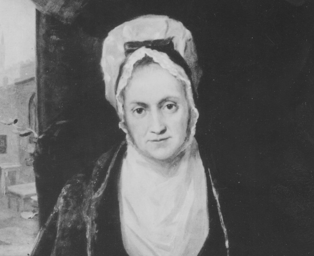 Black and white portrait of a woman in the 1700's wearing a bonnet and shown from the chest up