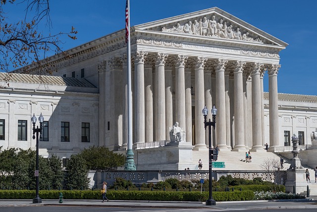 View of the US Supreme Court building against a blue sky