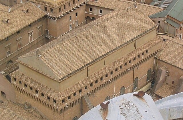 Exterior view of the plain, rectangular brick building where the Sistine Chapel is located