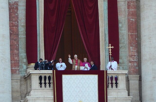View of Pope Leo XIV waving to the crowd from the balcony in his first appearance as pope