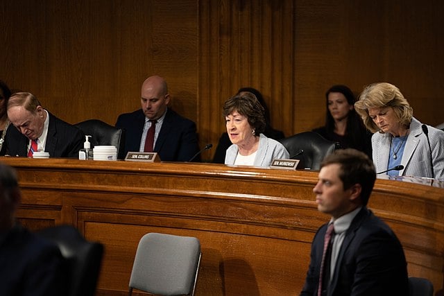 Front view of Sen. Susan Collins from shoulders up sitting in a legislative session