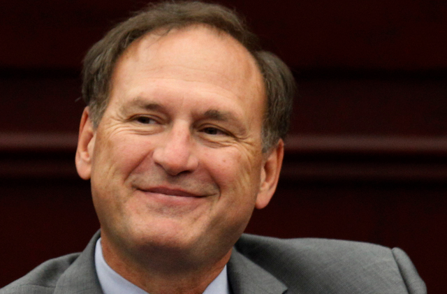 Picture from neck up of Justice Samuel Alito smiling