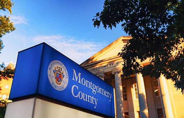 Picture of sign in front of public building saying "Montgomery County"