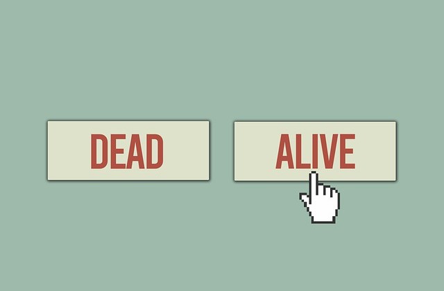 Illustration on green background with two buttons with red word on each. One says "DEAD" and the other says "ALIVE."