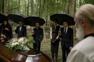 Mourners at a graveside service