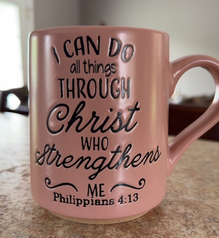 Mauve colored coffee mug with "I can do all things through Christ"