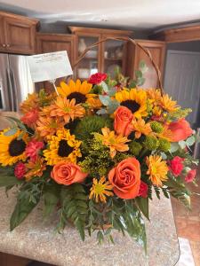 A beautiful floral arrangement for a memorial service. 