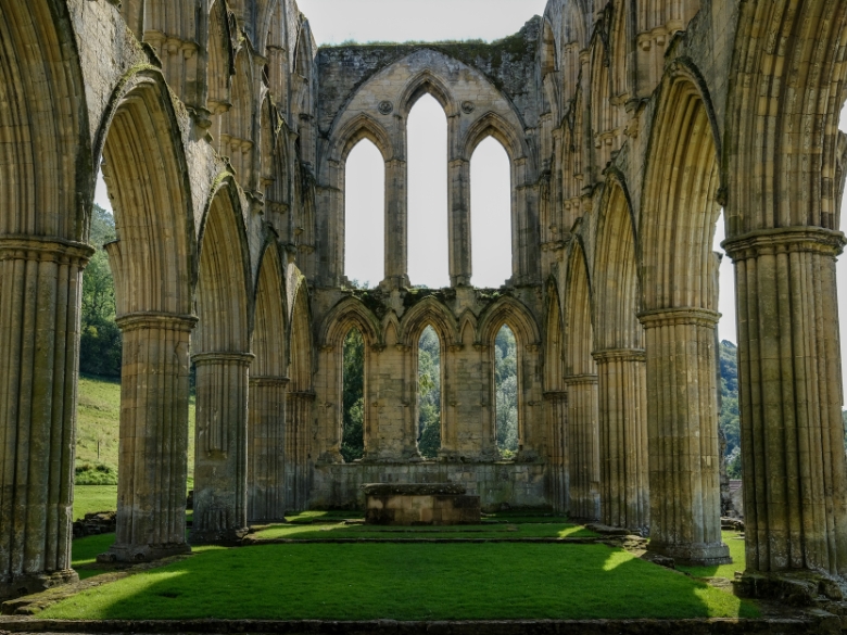 A Ruined Cathedral on Green Grass, representing the blended path of ChristoPaganism