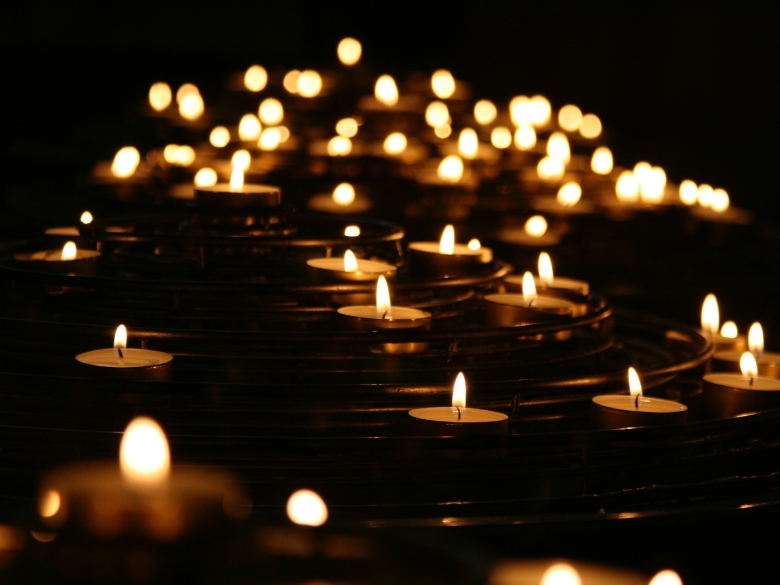 Tea Light Candles in a vigil for peace prayers against hate crimes