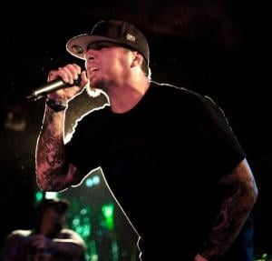 Photo | Sonny Sandoval, performing at the Belly Up Tavern in Solana Beach, California on May 17, 2011 | courtesy of Emcee Grady Wikimedia Creative Commons