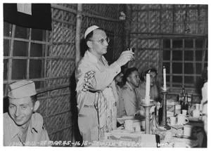 Photo | Chaplain Jacob Rudin conducting Passover service | photographer unknown, courtesy of Wikimedia Creative Commons