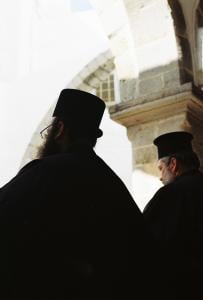 Photo | Greek Orthodox Priests at Monastery of Saint John, Patmos, Easter Orthodox | courtesy of Jakobthurn, Wikimedia Creative Commons