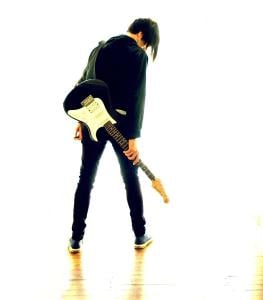 Photo | Emo Guy with Guitar | courtesy of Jason Rogers, More Snakebite Pictures, Wikimedia Creative Commons