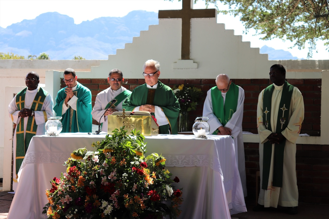 Priests Concelebrate Catholic Mass