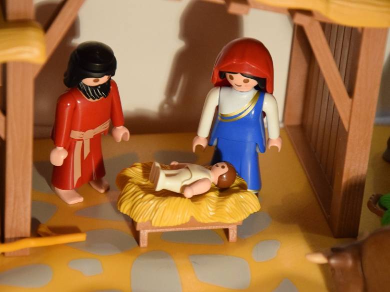Toy manger scene with Joseph, Mary, and baby Jesus