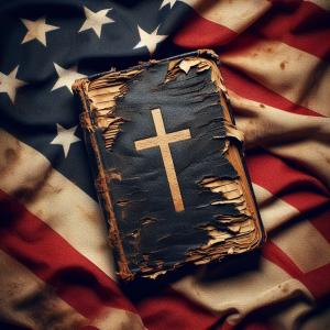 An old Bible on top of a torn and tattered American flag