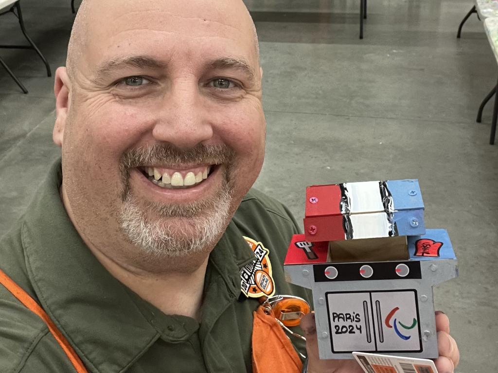 Mark Whitlock at Home Depot with his creation for the Kids' Workshop for June 2024 illustrating his Patheos article "Four Lessons Built in Me at Home Depot"