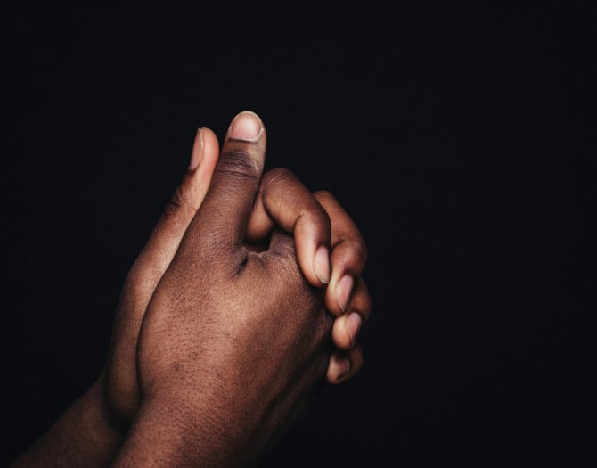 When asking God for something in prayer, petitioners may fold their hands like the person in the picture.