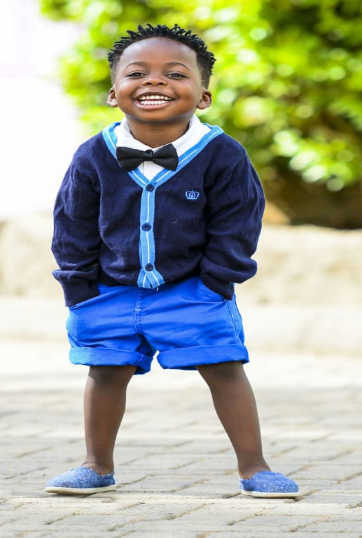 Psalm 27:10 can enable someone to smile, like this child though they are fatherless.