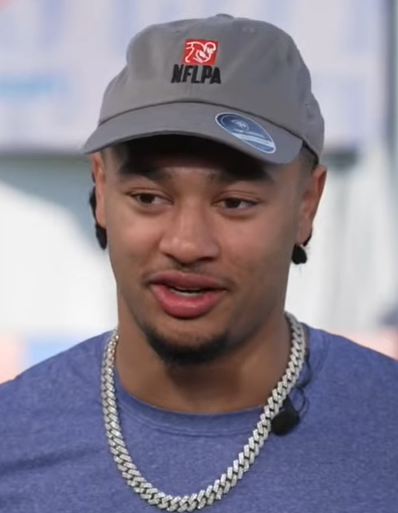 Kay Adams interviews Jaxon Smith-Njigba, one of the top wide receiver prospects in the 2023 NFL Draft, on an episode of 'Up & Adams' on FanDuel TV. Image is a screen shot of Youtube video ~ 31:16.