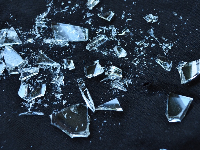 shattered glass on black background 