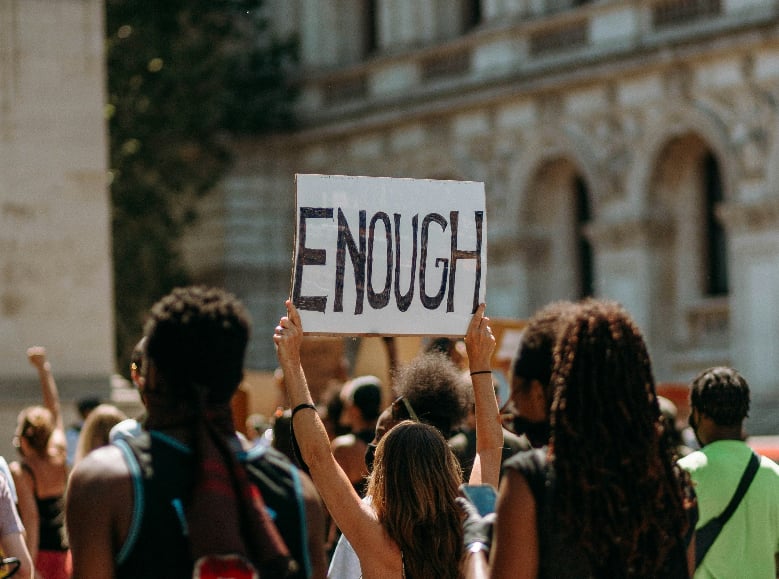 Protesting with an Enough Sign