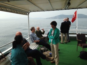 Participants keeping the conversation going as we depart from the island.