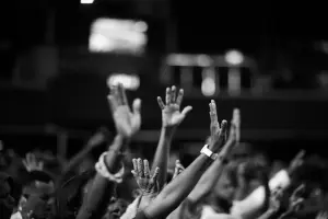 People Raising Hands in Worship (Black & White)