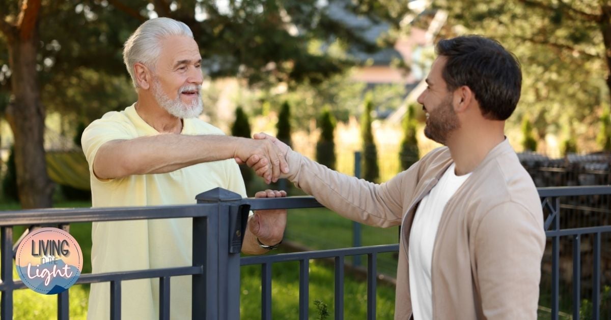 Neighbors shaking hands