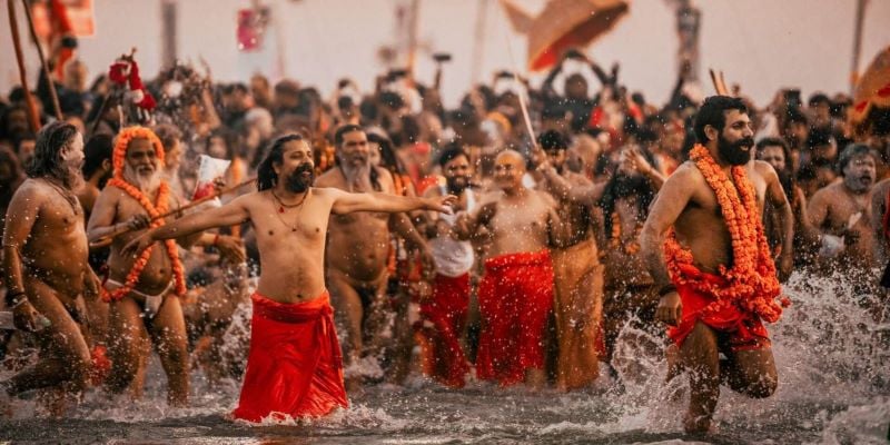 monks taking a dip in the river