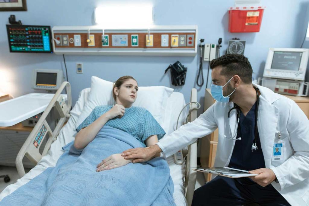 A doctor consults with a hospital patient.
