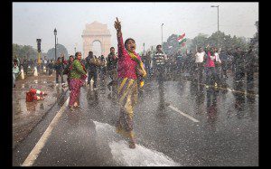 Scene from "India's Daughter," showing women protesting rape culture in India and being sprayed by waterhoses wielded by the authorities. (Leslee Udwin)