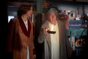 Dan Stevens (Charles Dickens); Christopher Plummer (Ebeneezer Scrooge) in The Man Who Invented Christmas