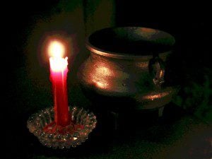 candle and cauldron