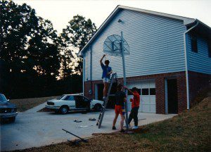 putting up the basketball goal at the new house - 1988