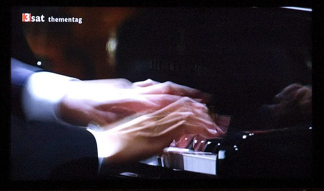 Lang Lang playing the piano. Photo Source: Flickr Creative Commons by digital cat https://www.flickr.com/photos/14646075@N03/